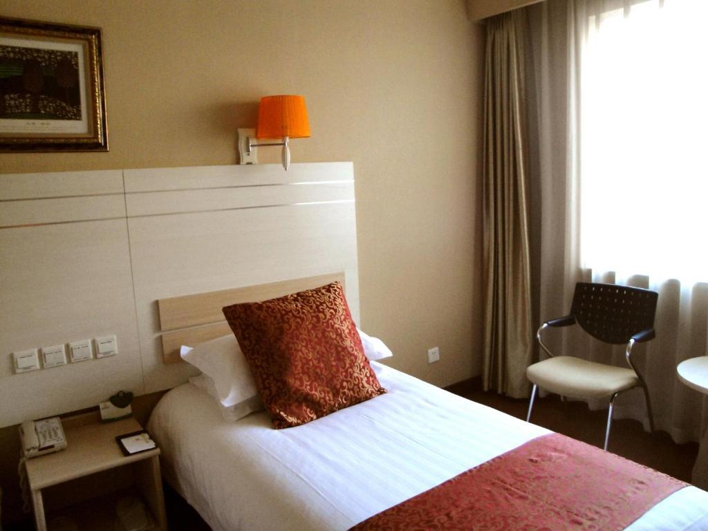 Overseas Chinese International Hotel Κινκντάο Δωμάτιο φωτογραφία